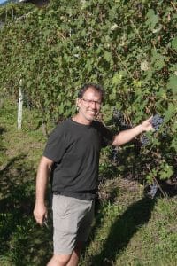 Francesco Stratta in his vineyard